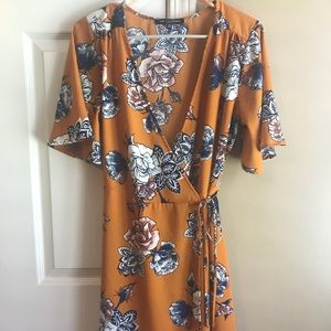 Kimono style wrap dress. Knee length. Worn twice.